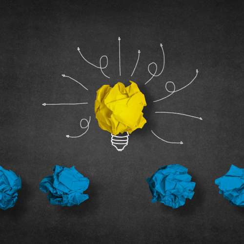 light-bulb-made-from-yellow-paper-ball-other-blue-balls